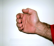 Begin forming a fist
